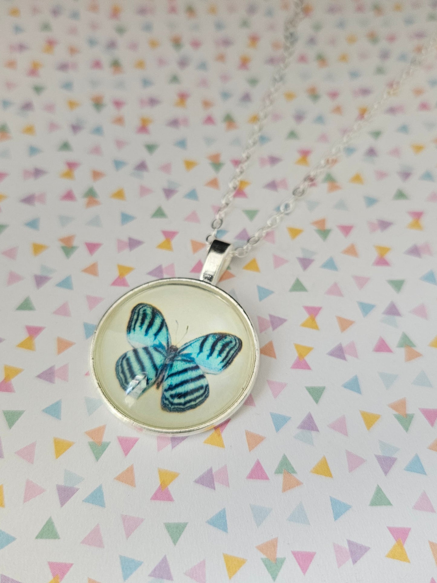 blue butterfly dome necklace