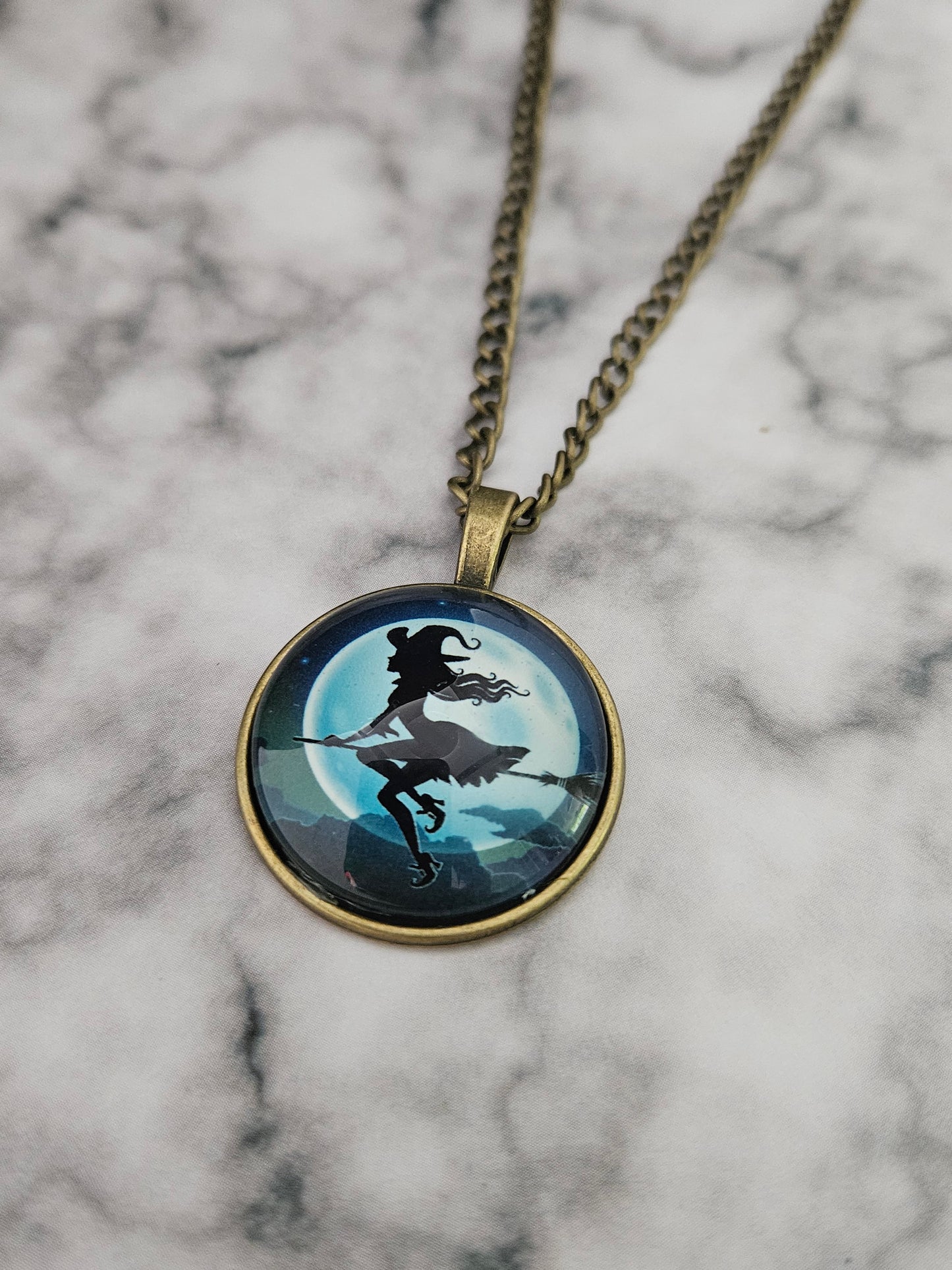 flying witch dome necklace
