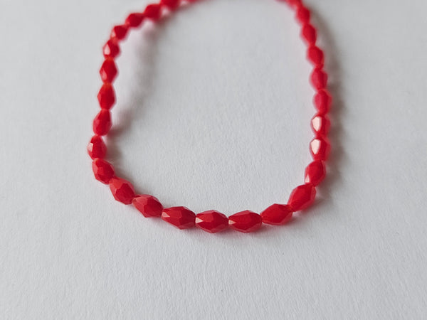 faceted glass beads - 5mm x 3mm - teardrop - red 