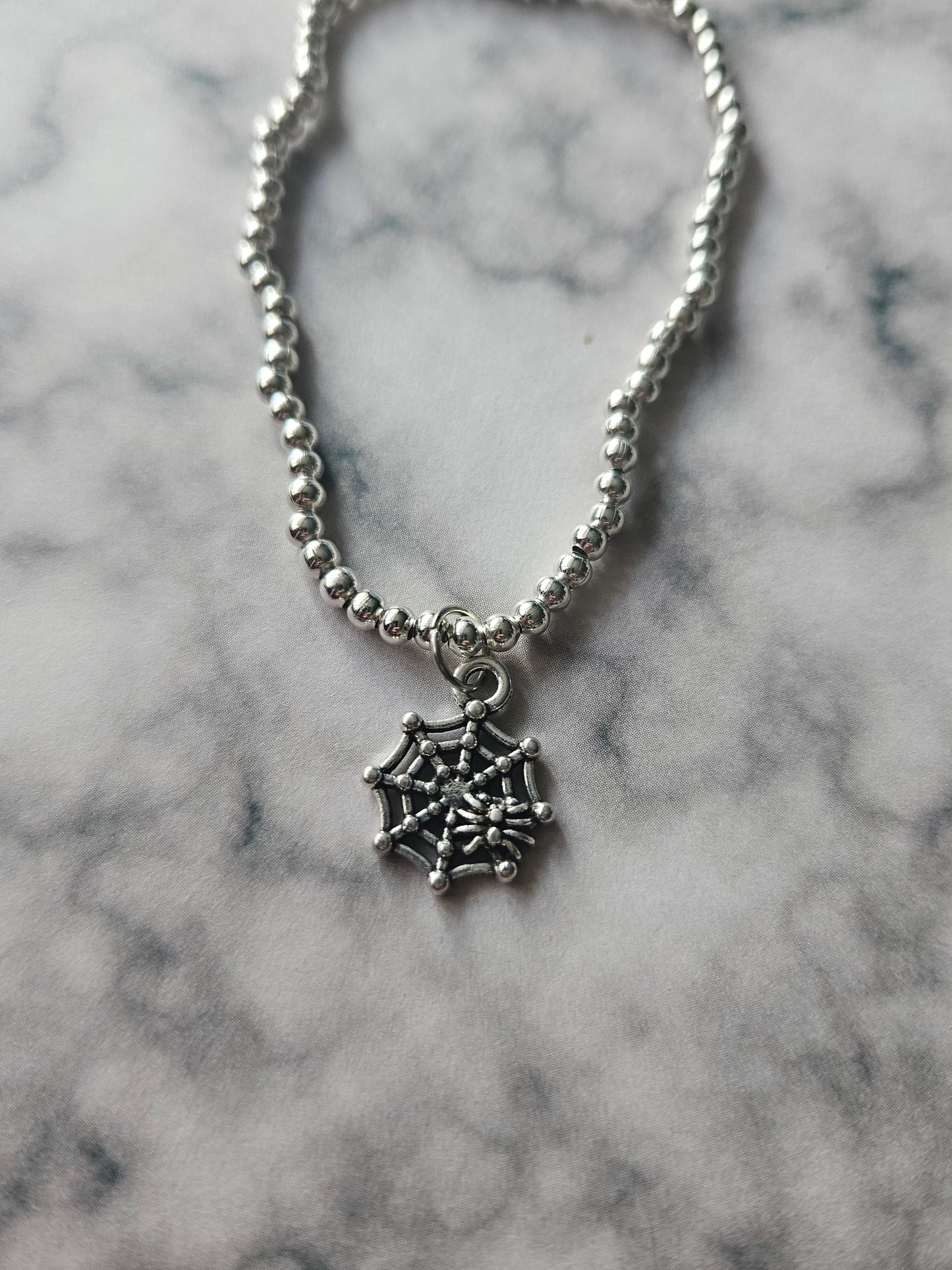 Beaded Spiderweb Bracelet | Silver Tone Beads | Enamel Spiderweb Charm | Elasticated Halloween Gothic Jewellery