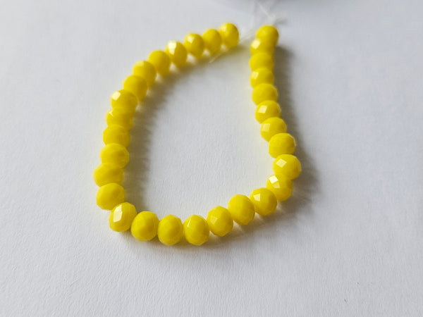 faceted glass beads - 6mm x 4mm - rondelle - yellow 
