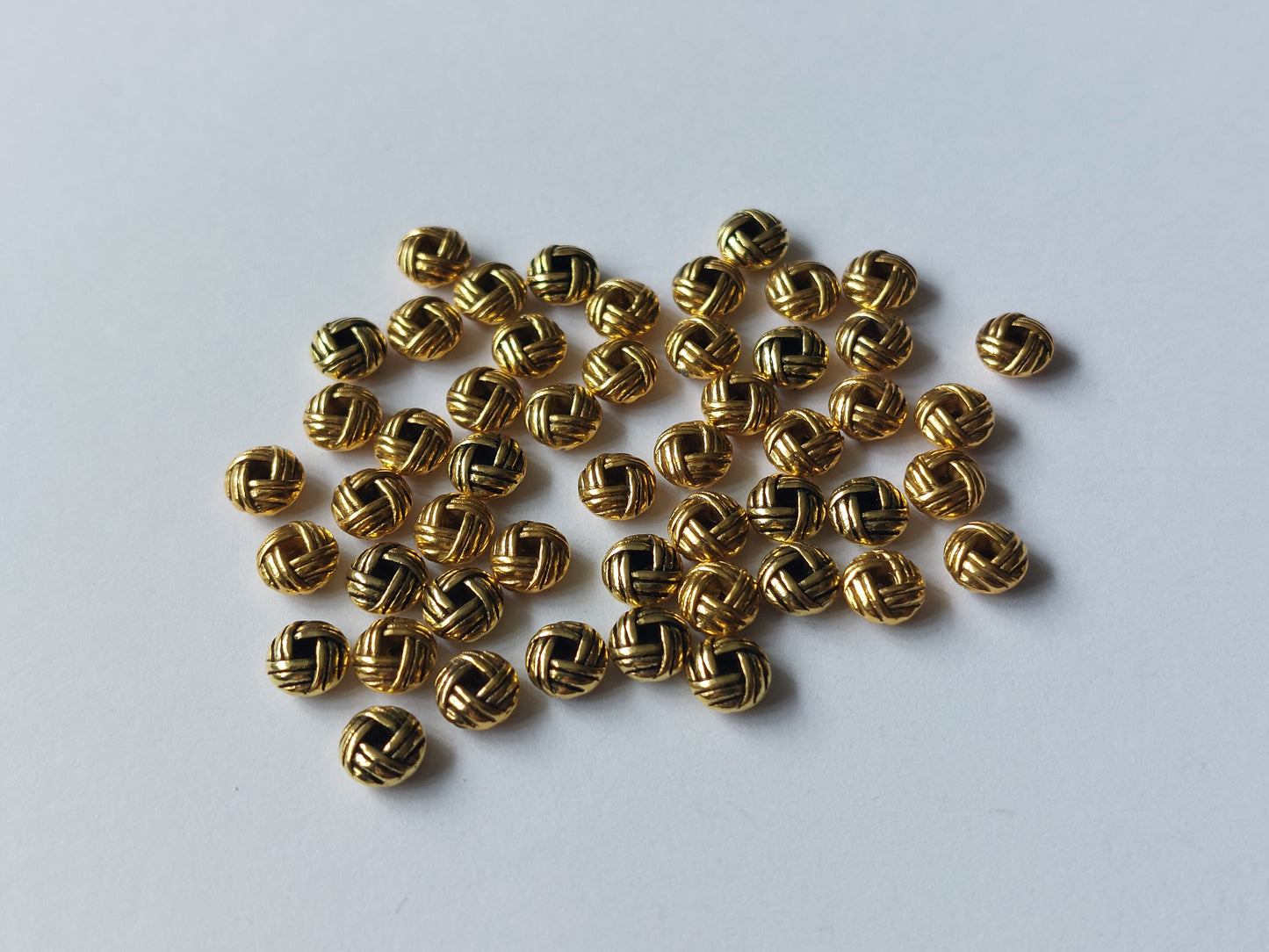 50 x alloy spacer beads - woven knot - 6mm - antique gold plated