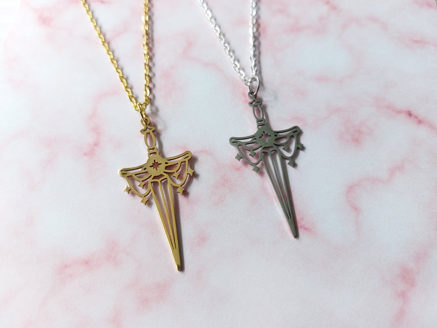 magic dagger necklaces 