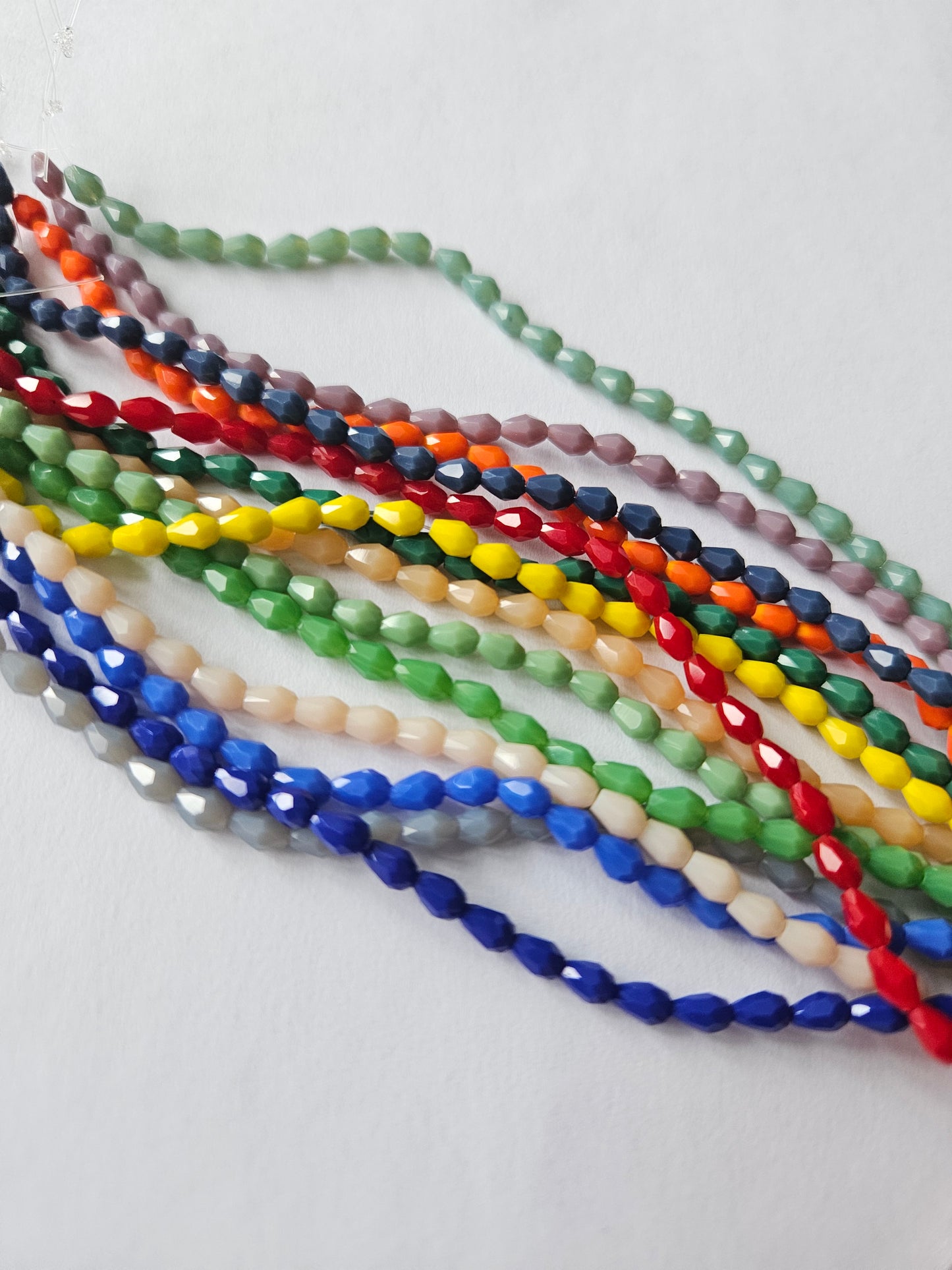 faceted glass beads - 5mm x 3mm - teardrop