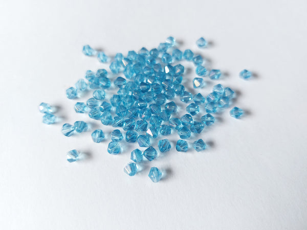 4mm AB plated glass bicone beads - light blue