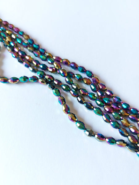 electroplated glass beads - faceted rice - 6mm x 4mm - rainbow