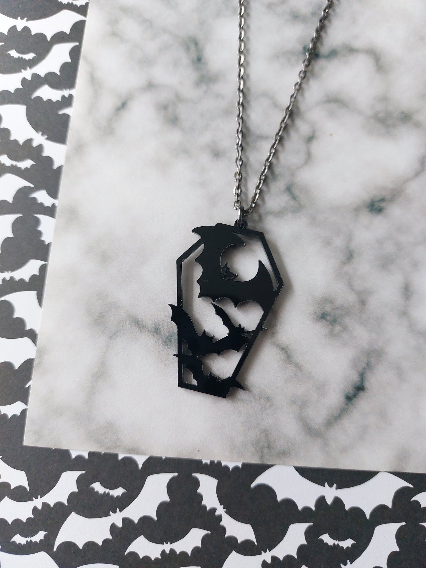 black bats coffin necklace