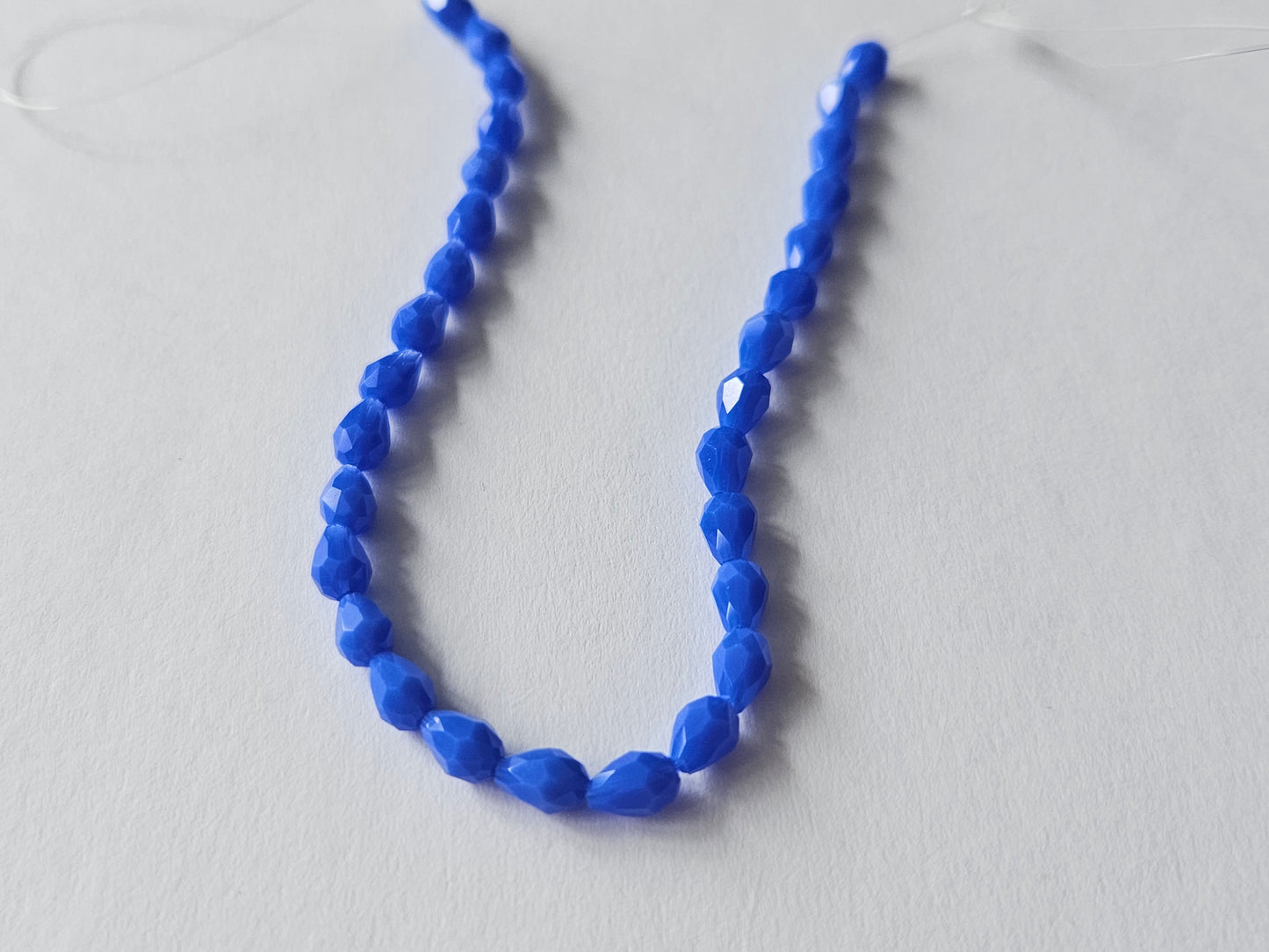 faceted glass beads - 5mm x 3mm - teadrop - blue 