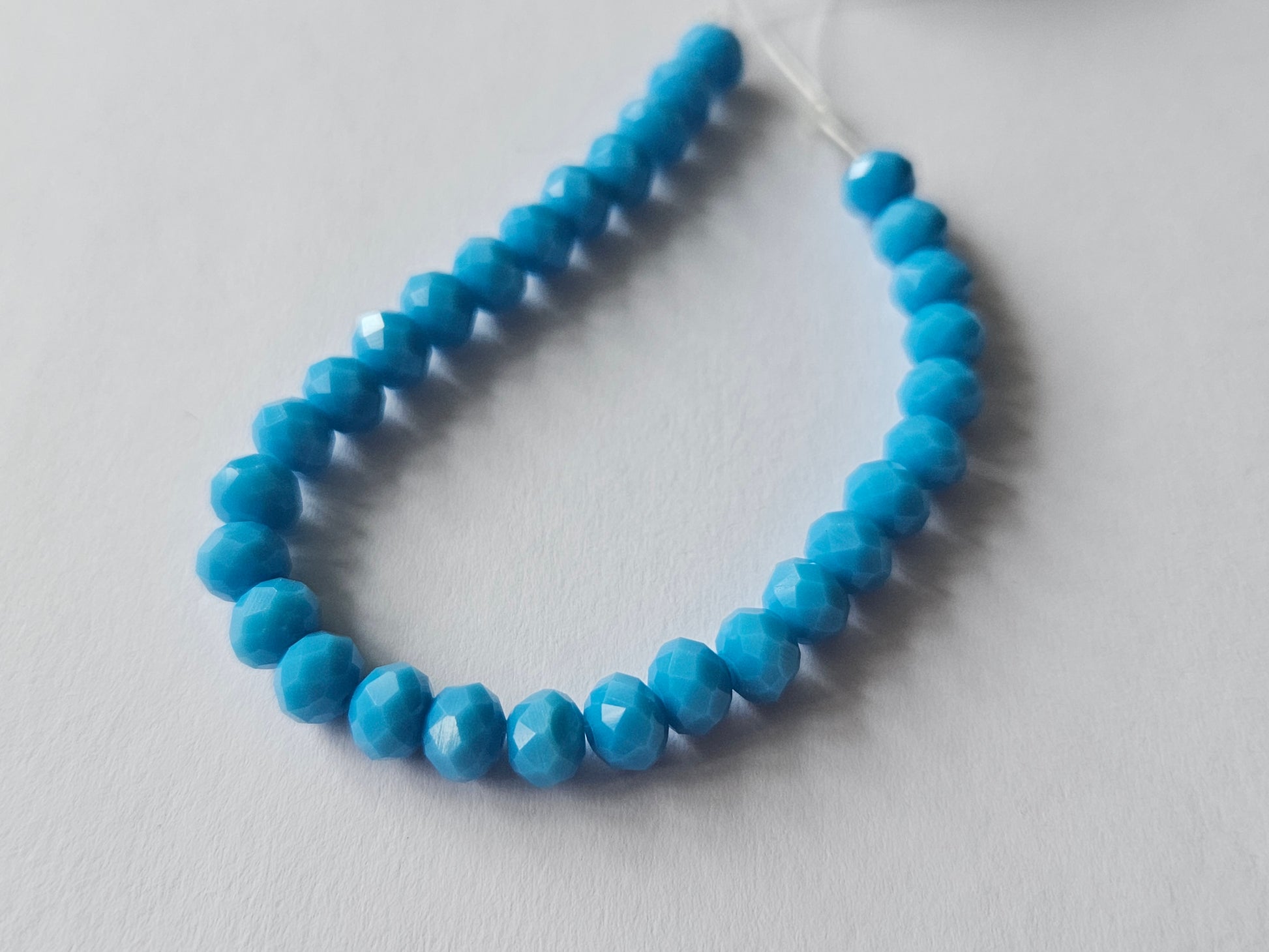 faceted glass beads - 6mm x 4mm - rondelle - bright blue 