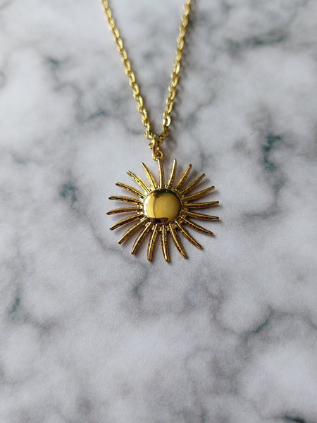 sun/pinwheel necklace - gold 