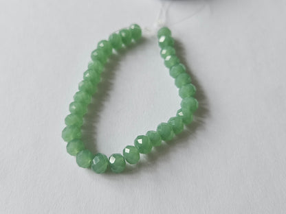 faceted glass beads - 6mm x 4mm - rondelle - green