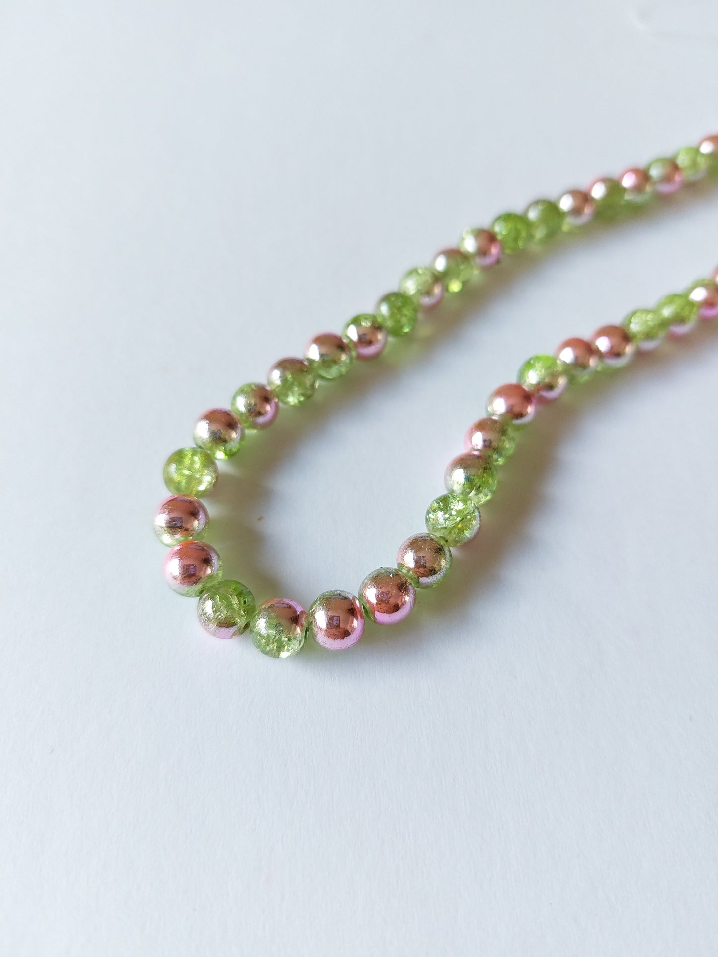 6mm half-plated crackle glass beads - round - 6mm - green (pink plating) 