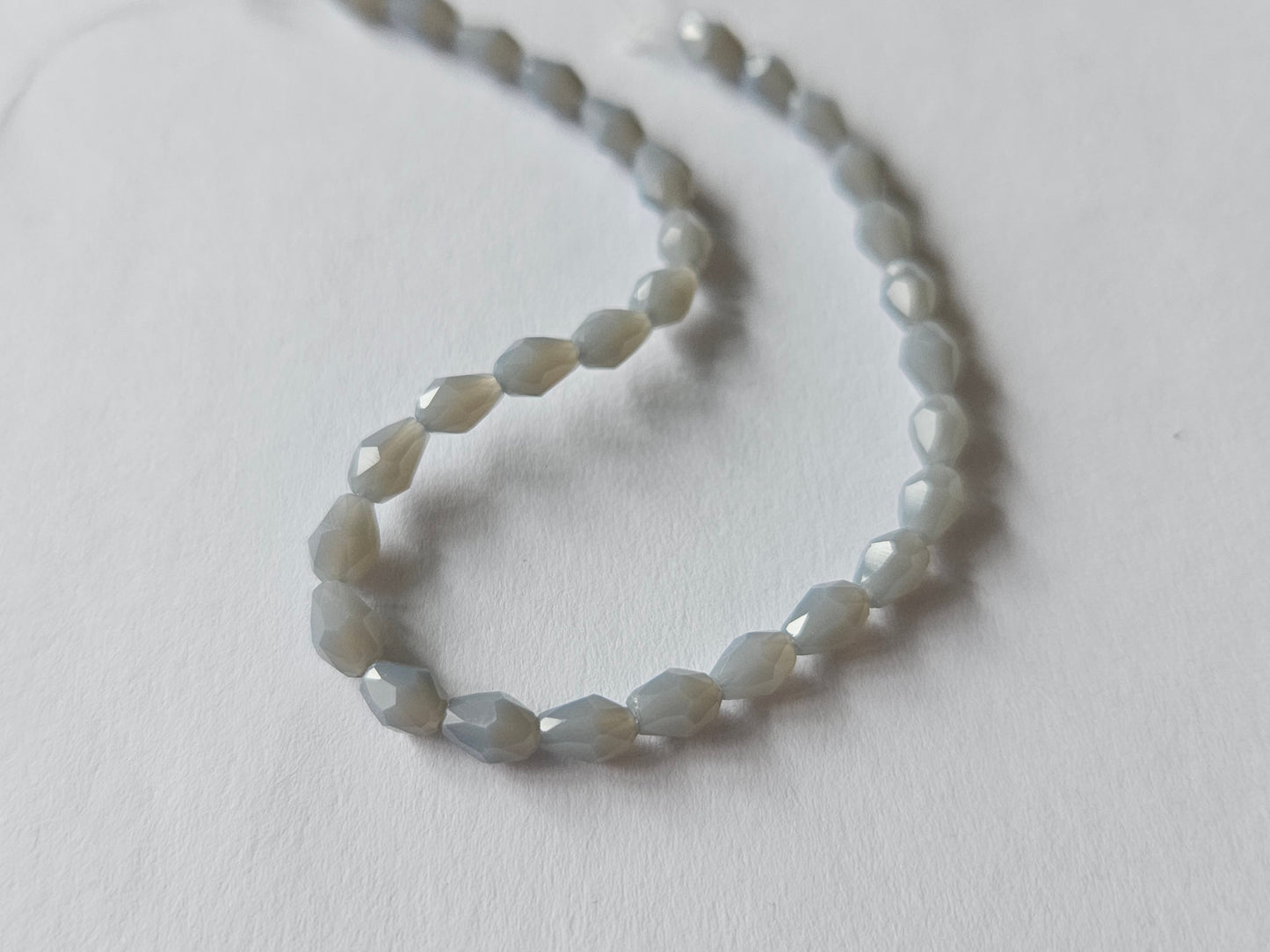 faceted glass beads - 5mm x 3mm - teardrop - grey