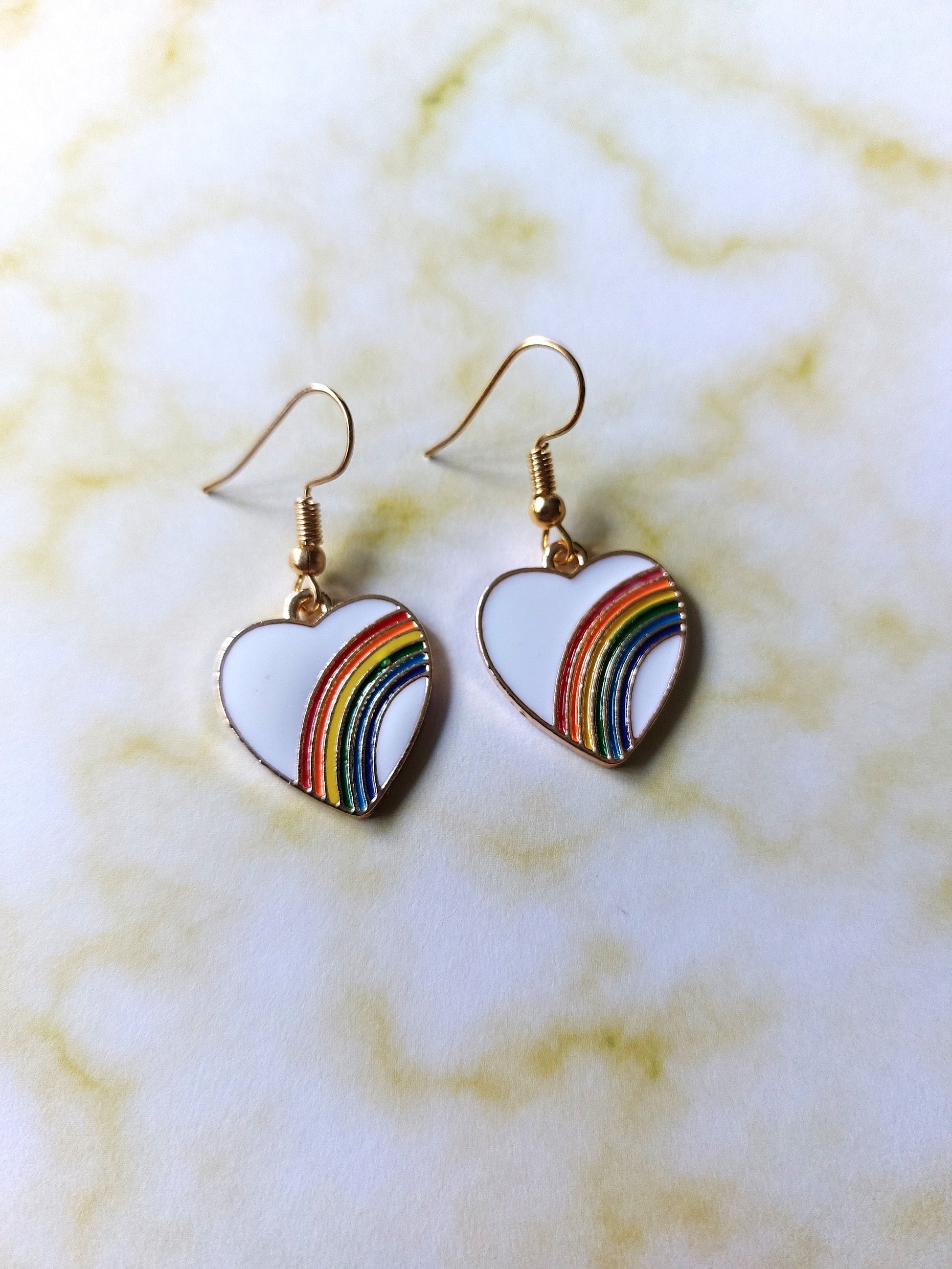 white rainbow heart earrings