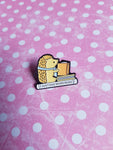 enamel pin badge - "just one more page" reading hedgehog