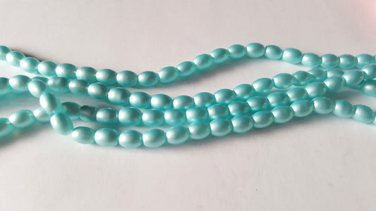 sprayed glass oval beads - pastels - blue 