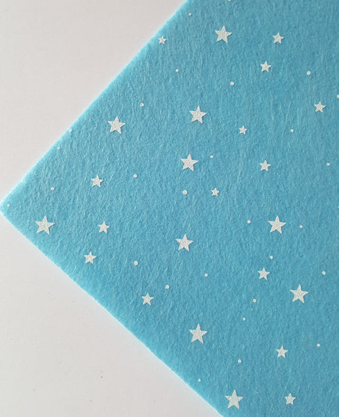 printed stars felt - bright blue