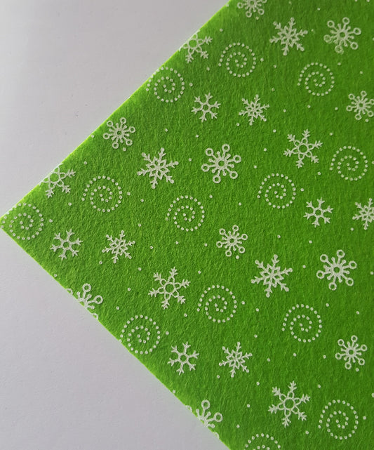 printed felt sheet - snowflakes - bright green