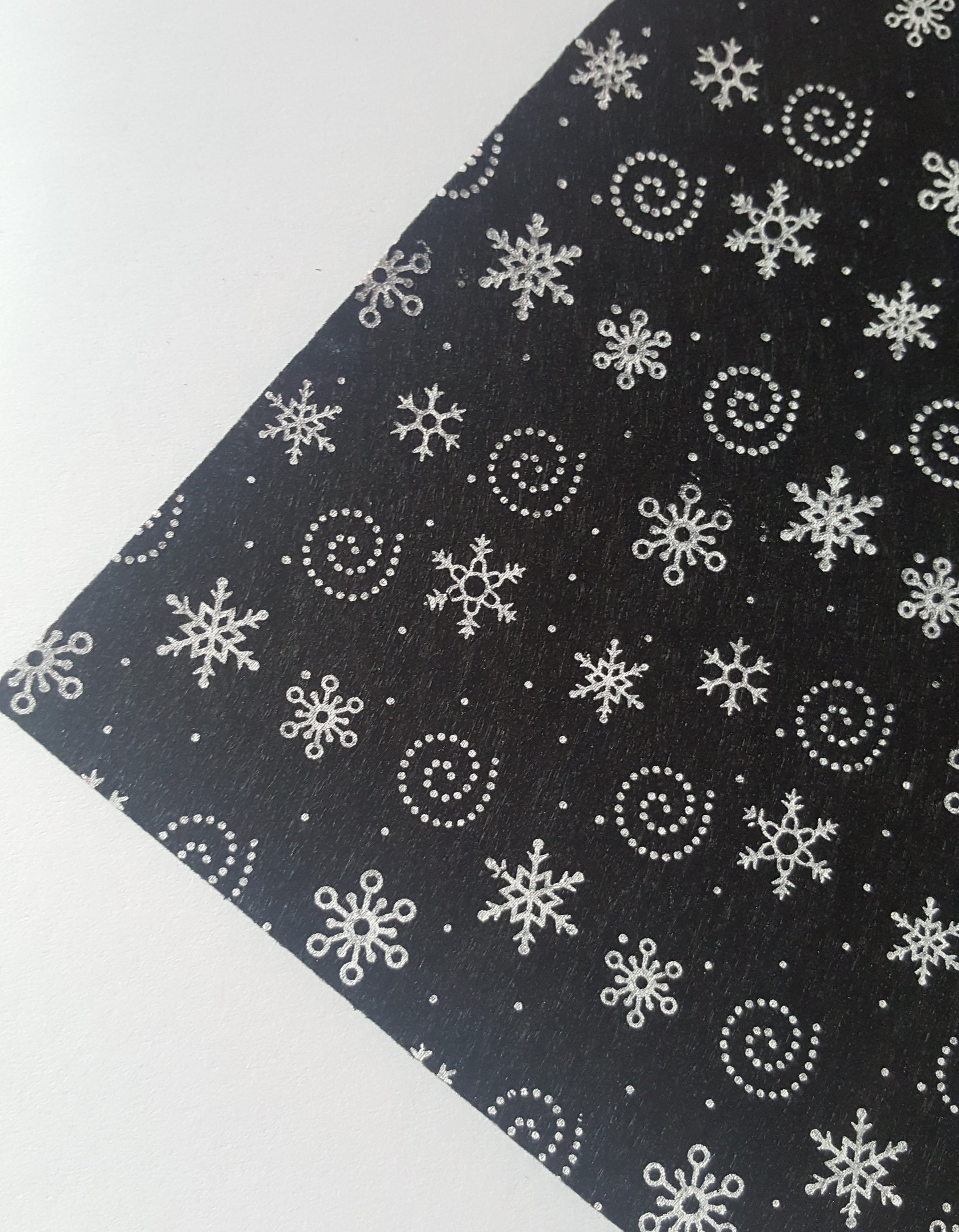 printed felt sheet - snowflakes - black 