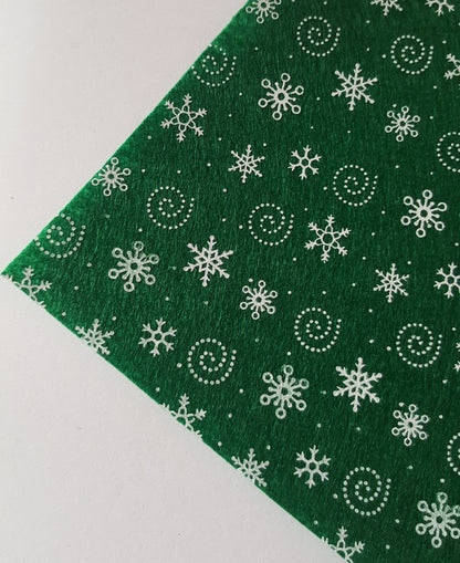 printed felt sheet - snowflakes - green