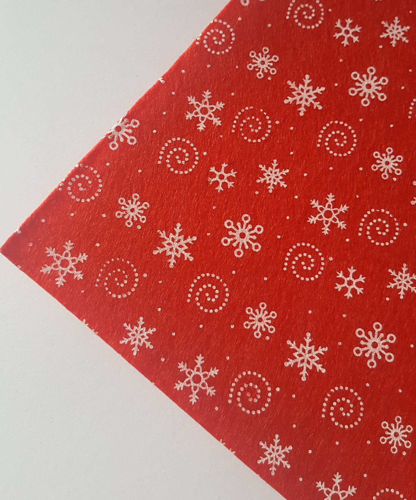 printed felt sheet - snowflakes - red