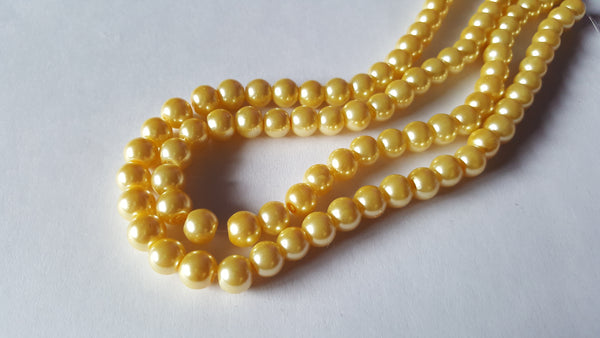 glass pearl beads - pale golden