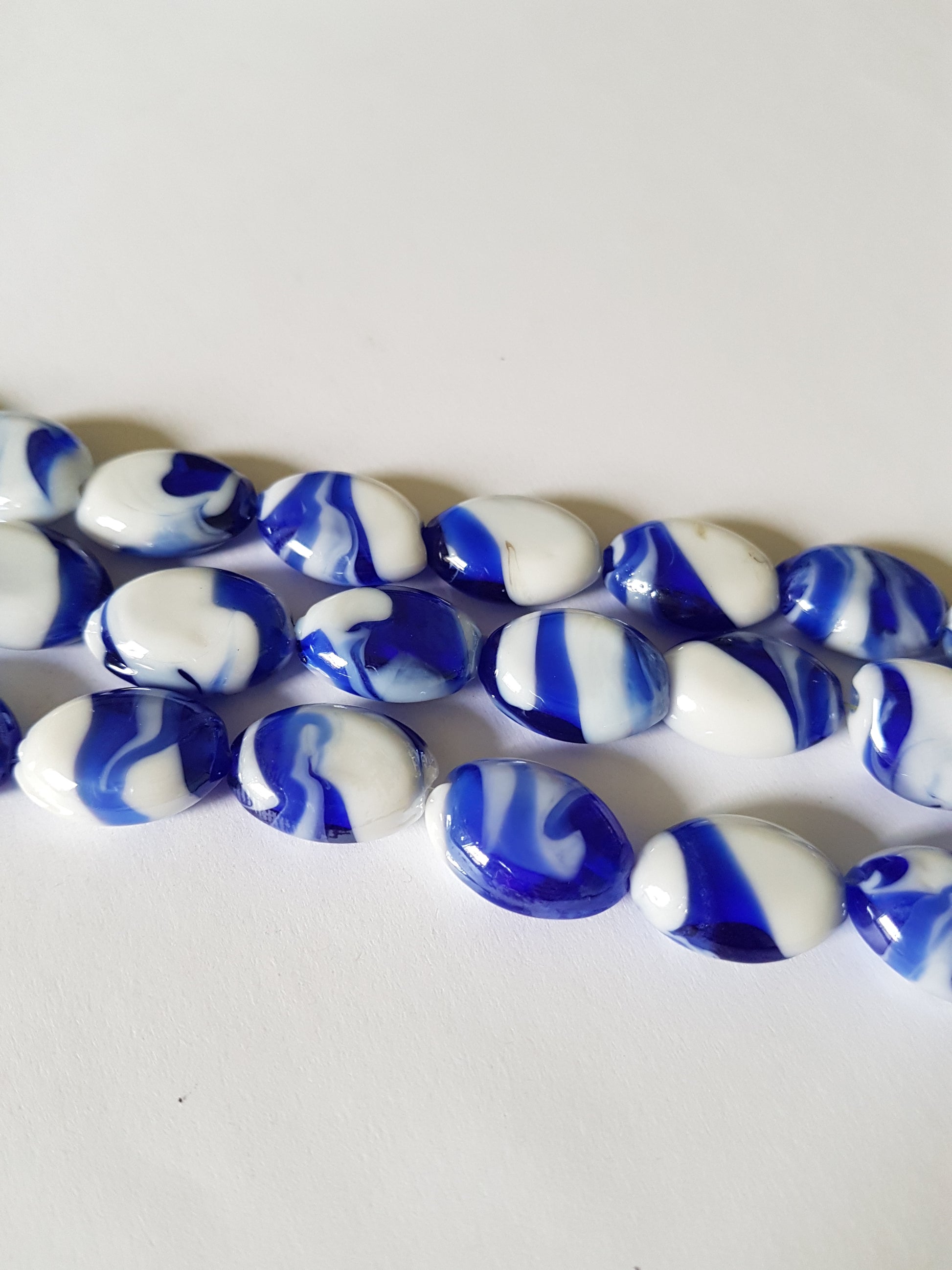 18mm glass lampwork oval beads - blue/white