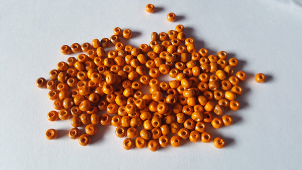 5.5mm wooden round beads - orange