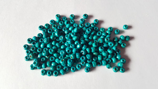 5.5mm wooden round beads - teal