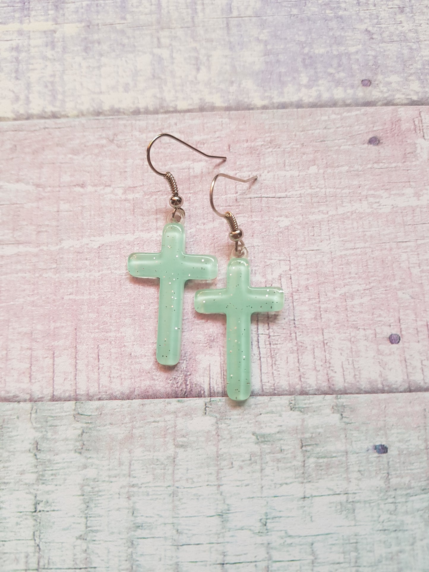 pastel glitter cross earrings - aqua