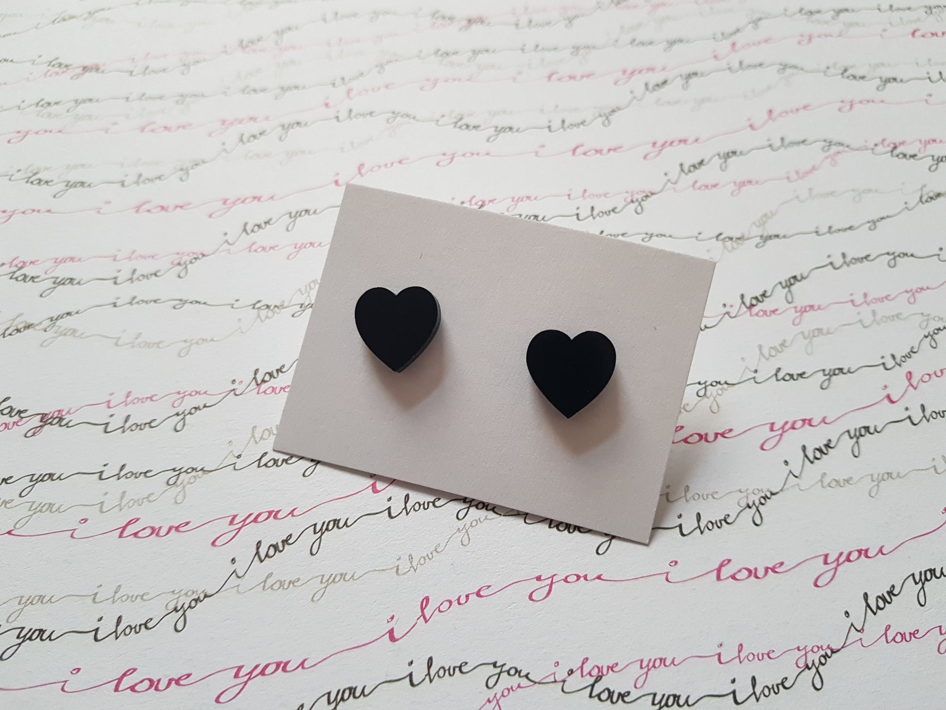 heart stud earrings - black