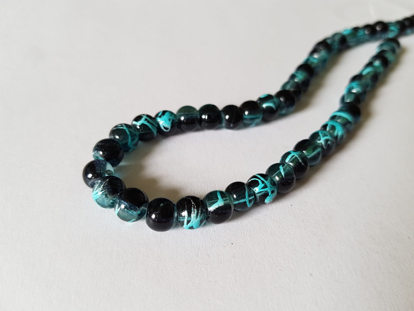 6mm black drawbench glass beads - bright blue