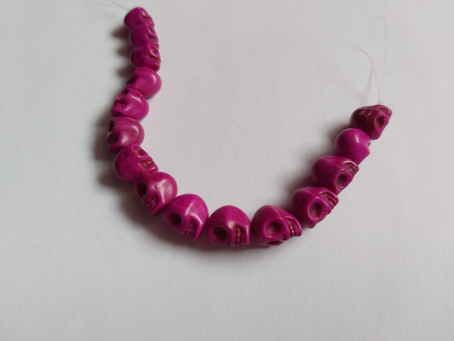 9mm turquoise skull beads - bright purple