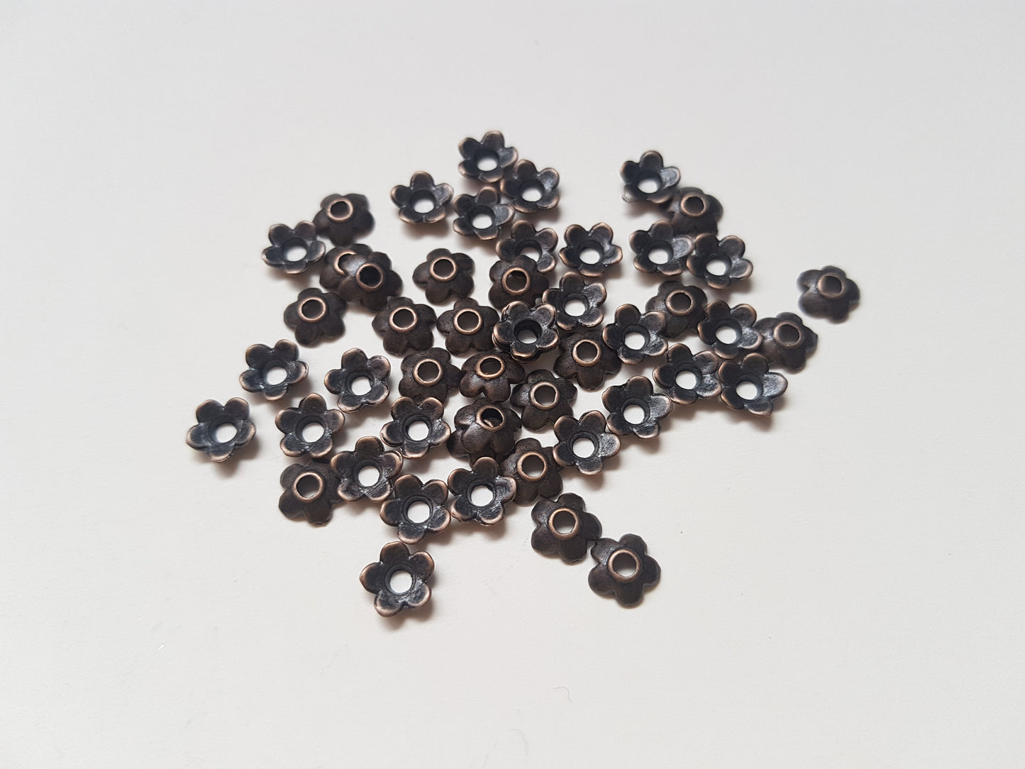 6.5mm flower beadcaps - antique bronze