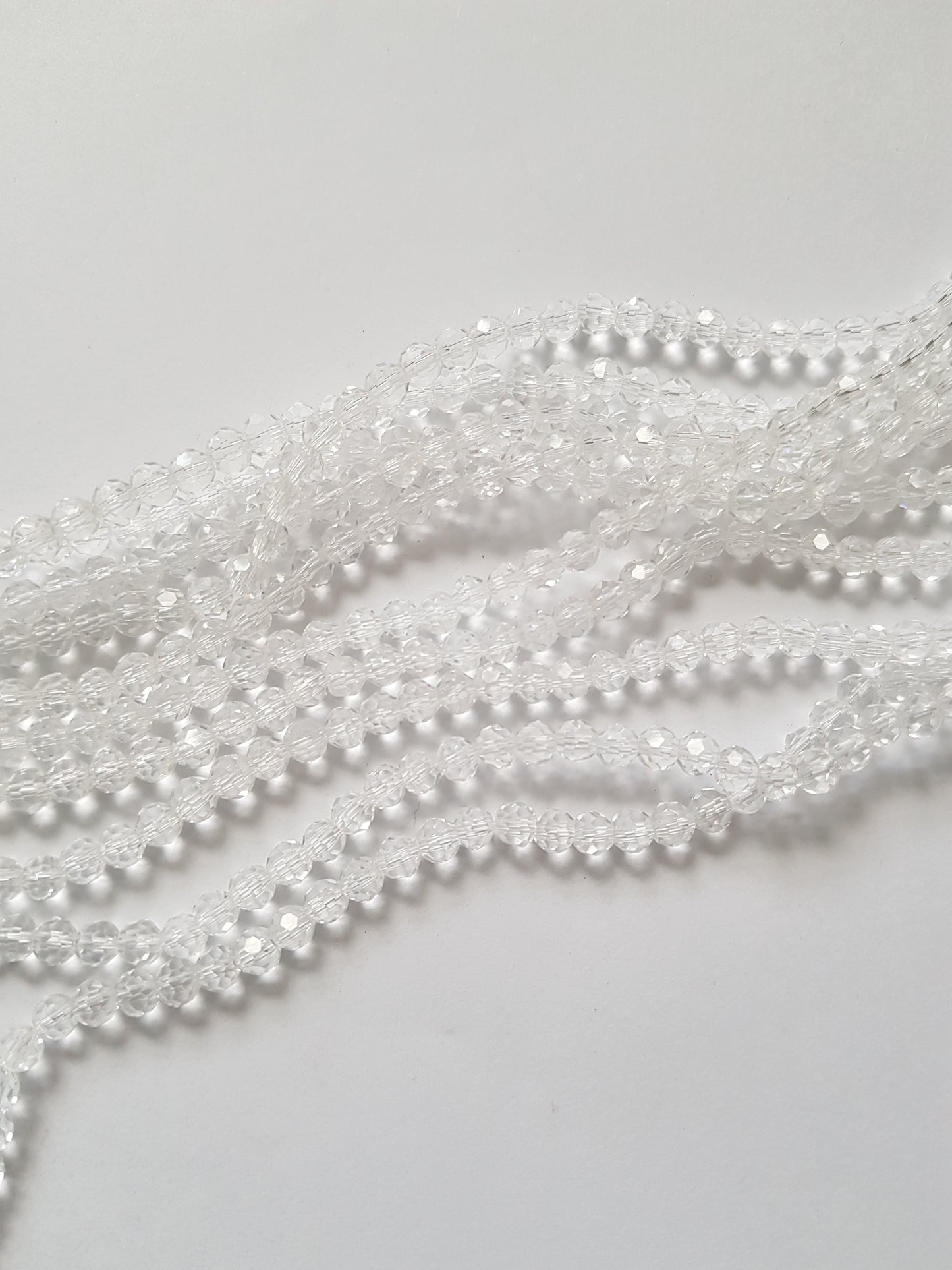 4mm faceted round glass beads - clear