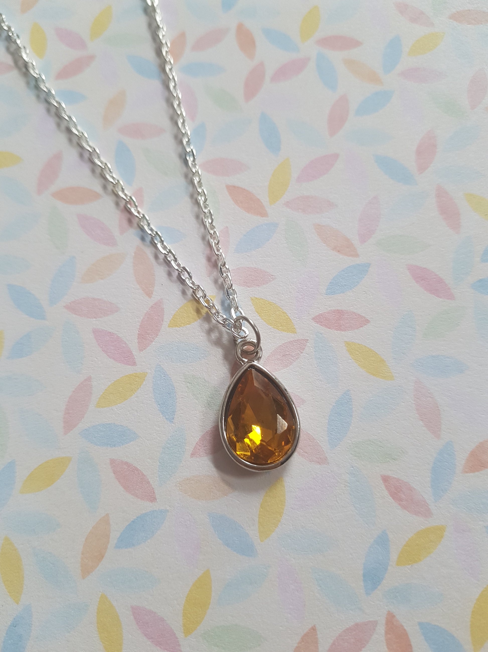 faceted glass drop necklace - golden