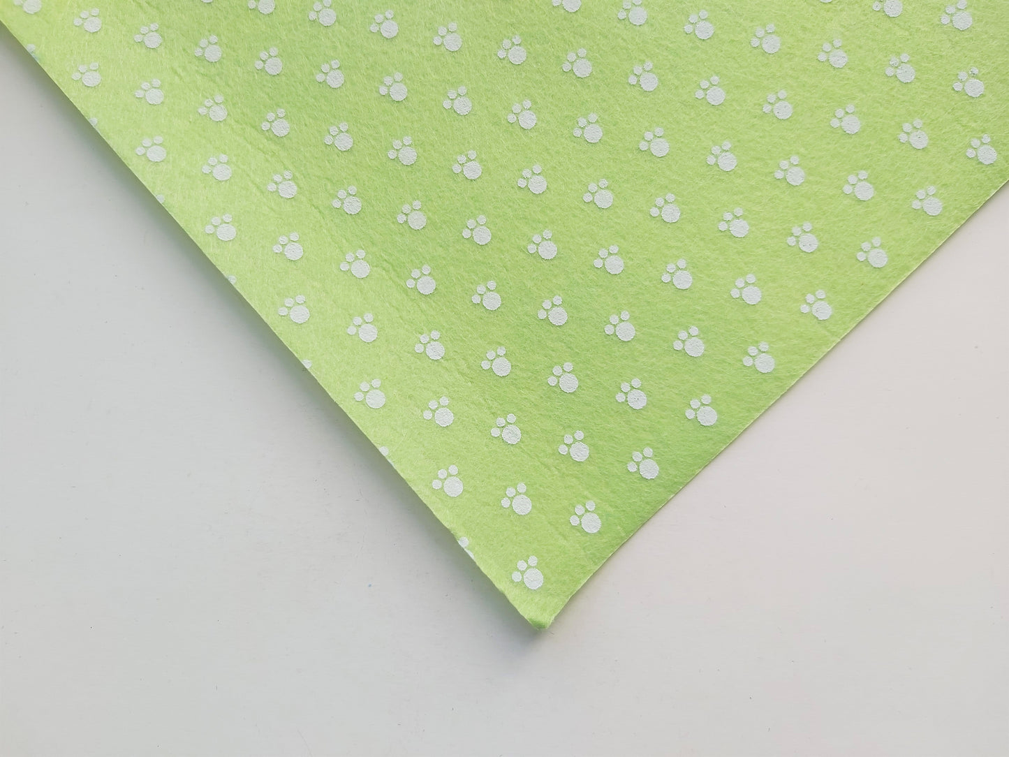 12" printed felt sheet - pawprints - green