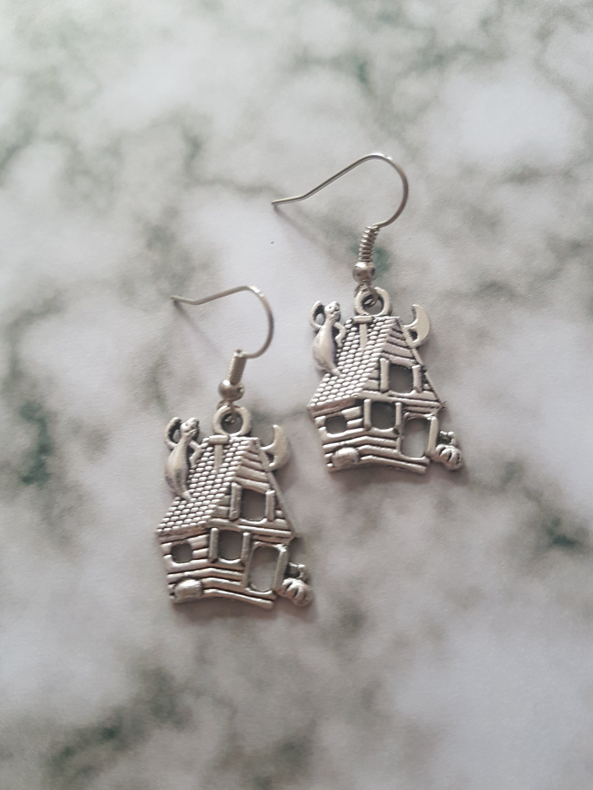 haunted house earrings