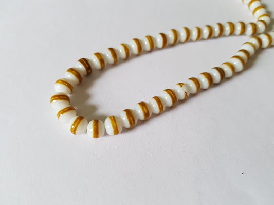 striped glass drawbench beads - mustard