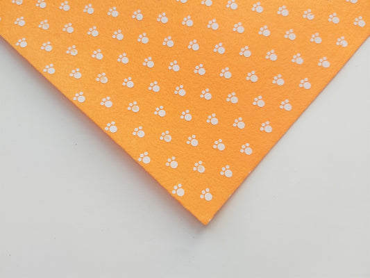 12" printed felt sheet - pawprints - orange