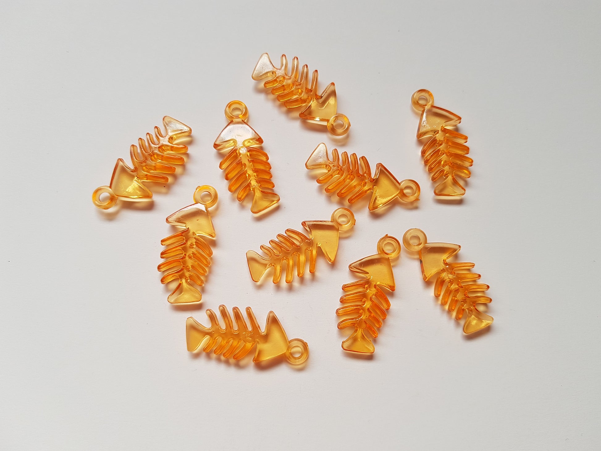 33mm acrylic fish skeleton pendants - orange