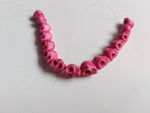 9mm turquoise skull beads - pink