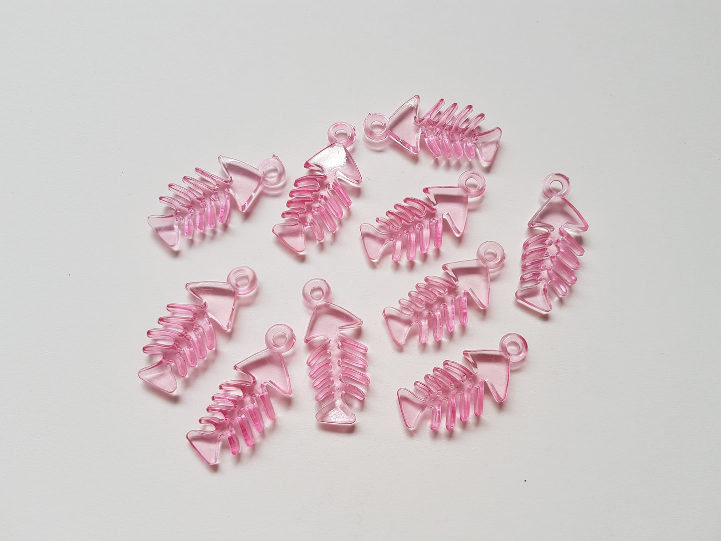 33mm acrylic fish skeleton pendants - pink