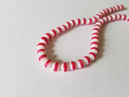 striped glass drawbench beads - bright pink