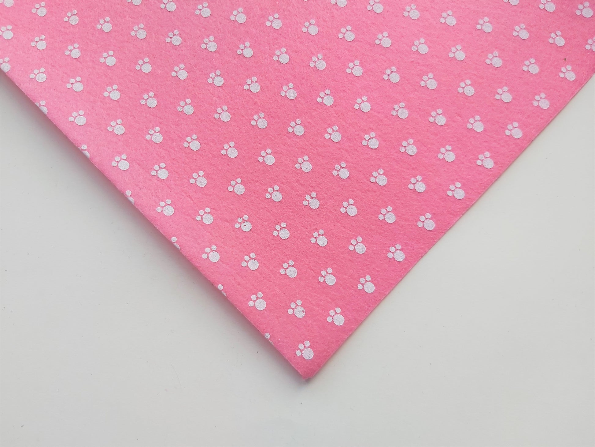 12" printed felt sheet - pawprints - pink