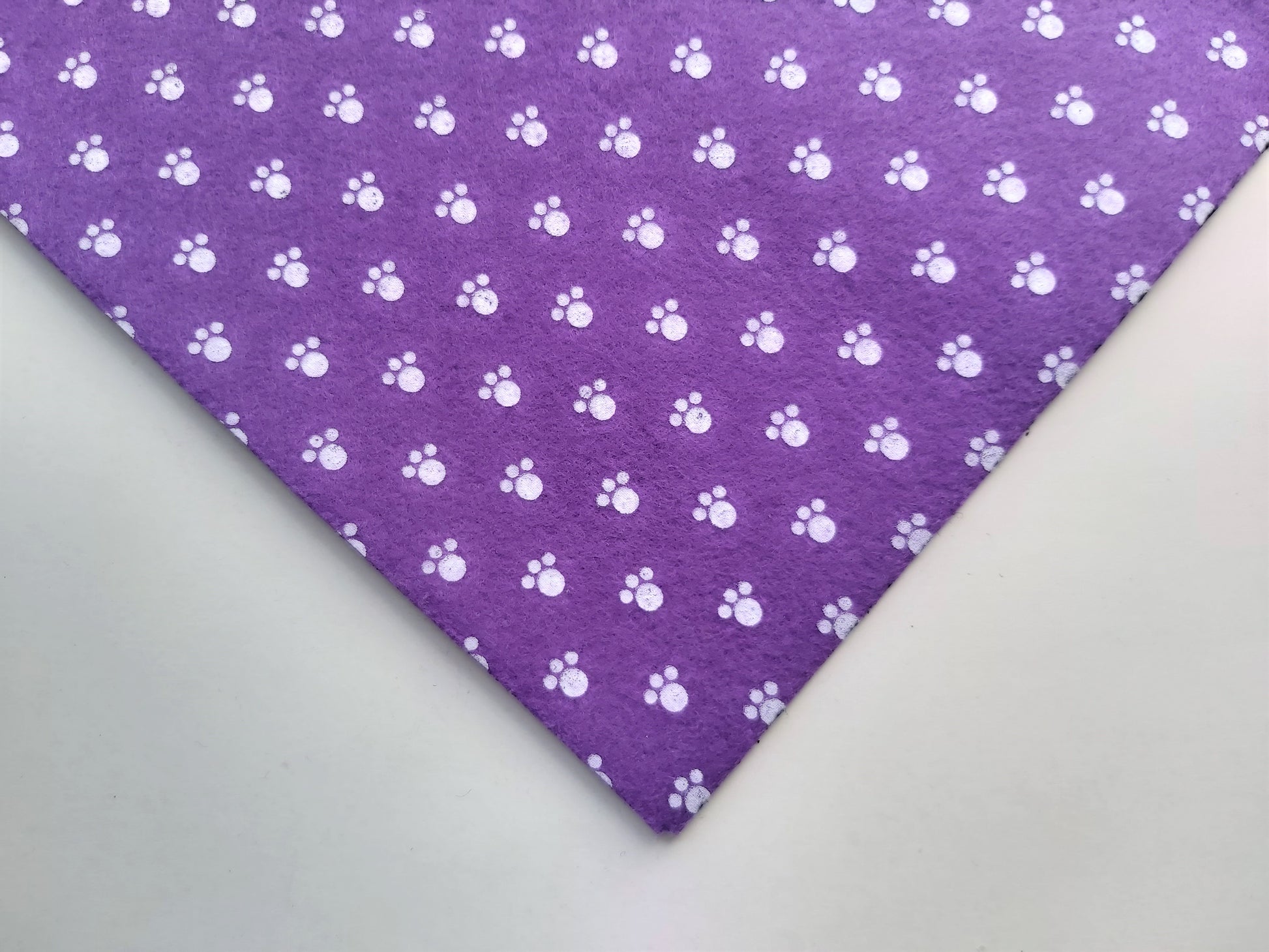 12" printed felt sheet - pawprints - purple