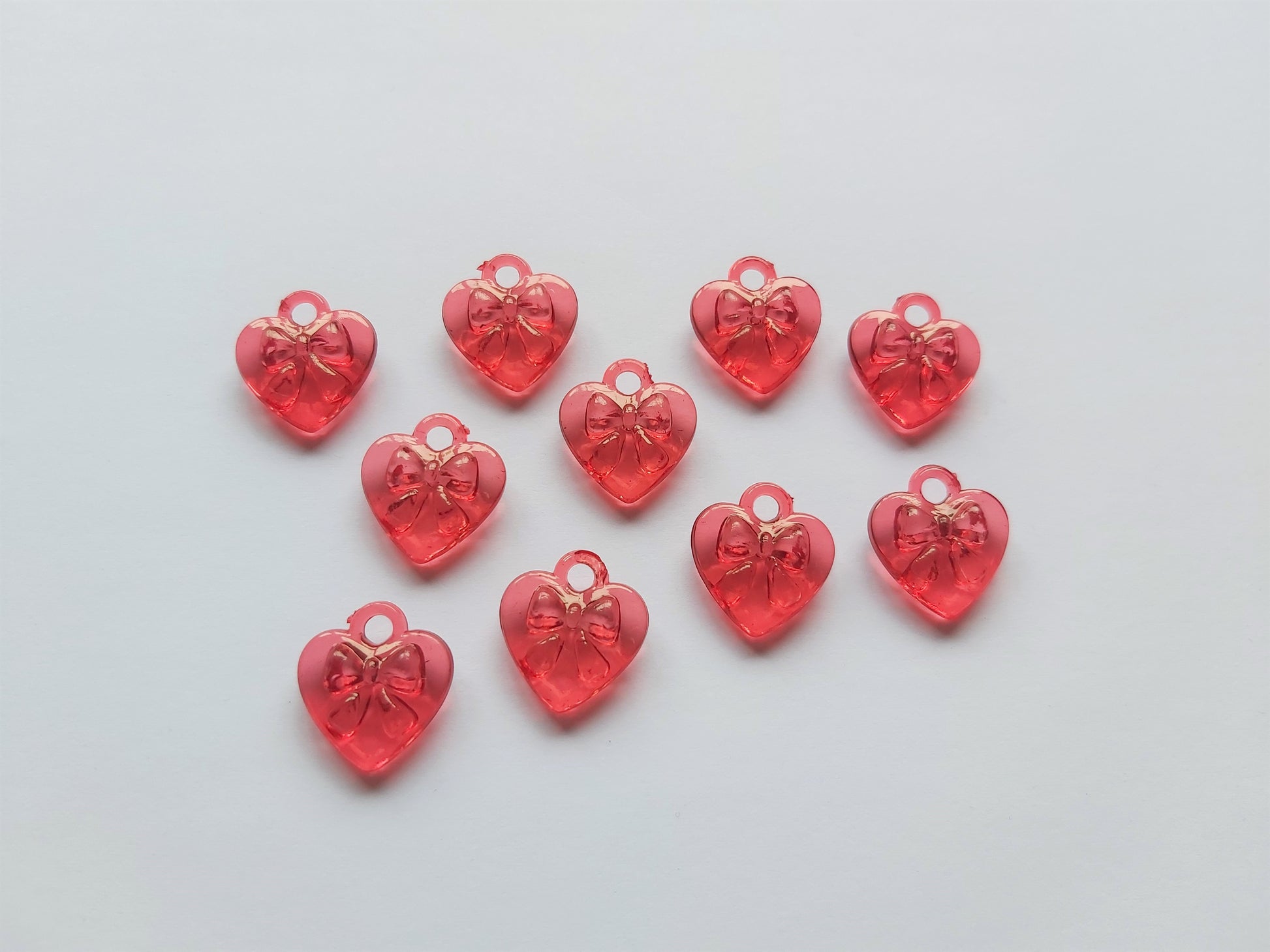 17mm acrylic heart pendants - bow design - red