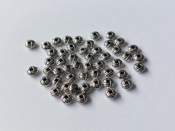 50 x alloy spacer beads - woven knot - 6mm - silver plated 