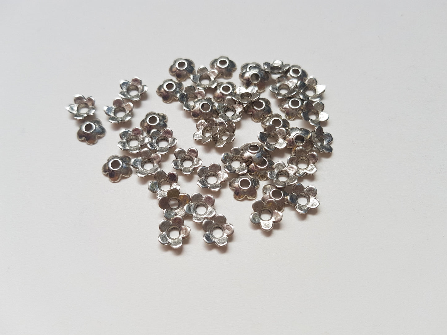 6.5mm flower beadcaps - silver plated