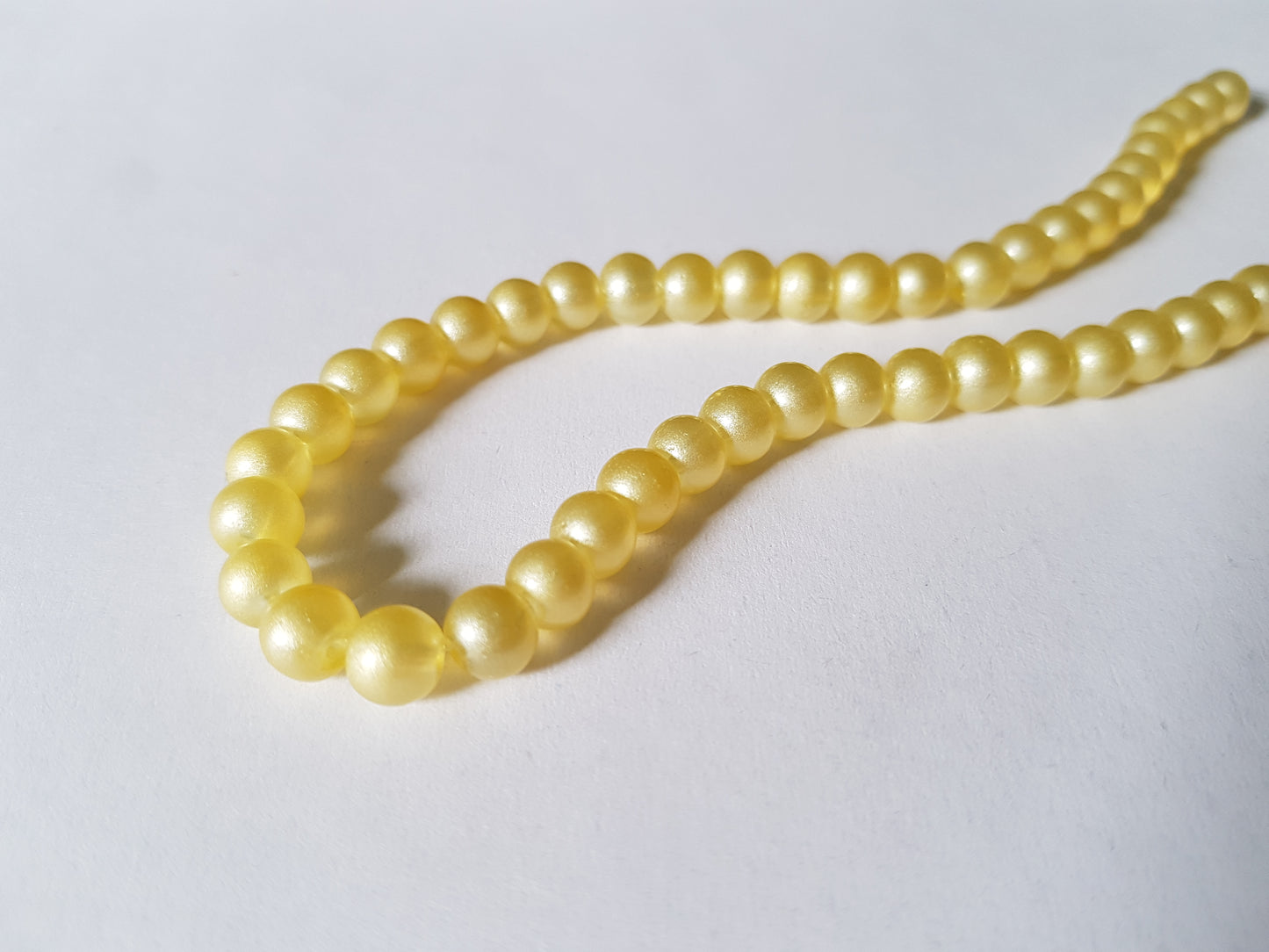 6mm pastel glass round beads - yellow